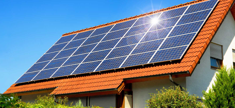 Solar panel on a red roof