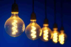 Glowing Edison bulbs symbolizing the shift to LED lighting for better energy savings and sustainability.